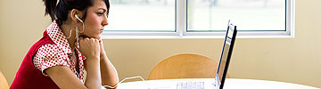 Girl listening to computer