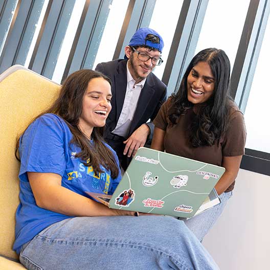 students, laptop, smiling
