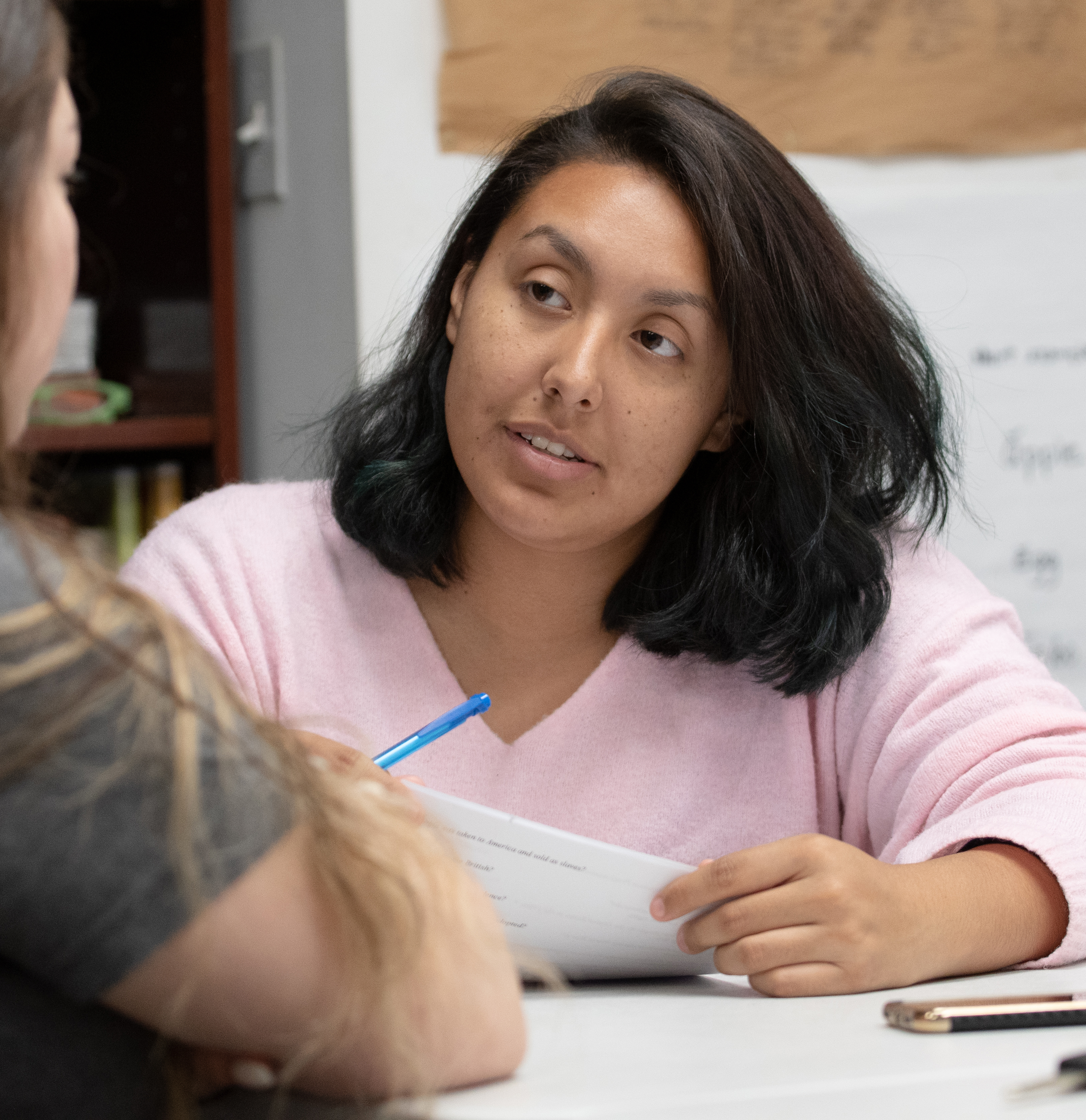 Students tutoring at Carecen